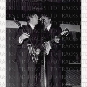 003041 - Paul McCartney & George Harrison at Borashallen, Sweden 28th October 1963